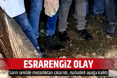 Esrarengiz olay! Sarılı şekilde mezarlıktan çıkarıldı